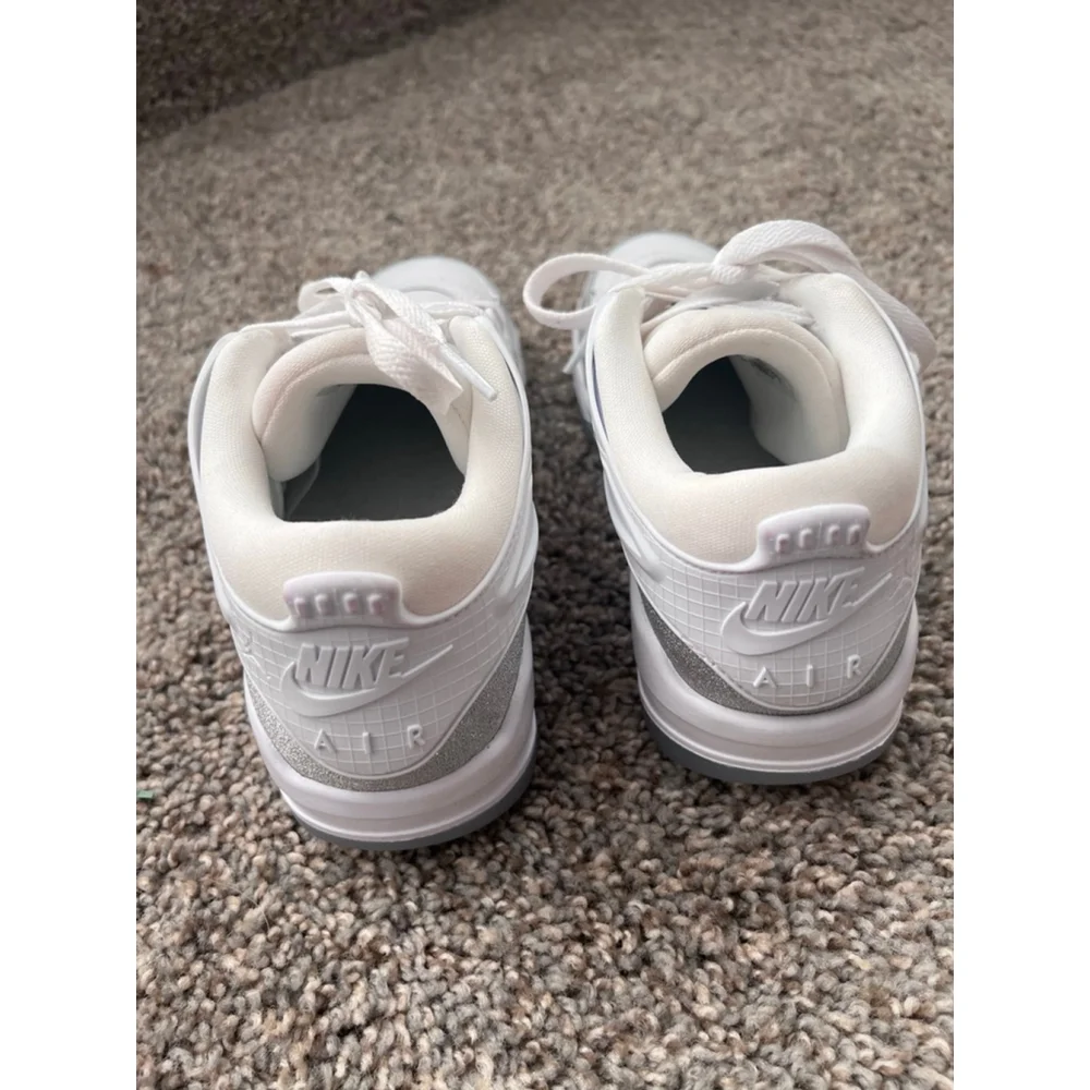 Air Jordan 4 RM 'White Silver Glitter' sneakers with the style code HQ34 size 7